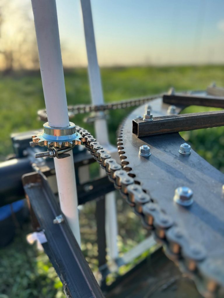 Chain holder for rotating tower