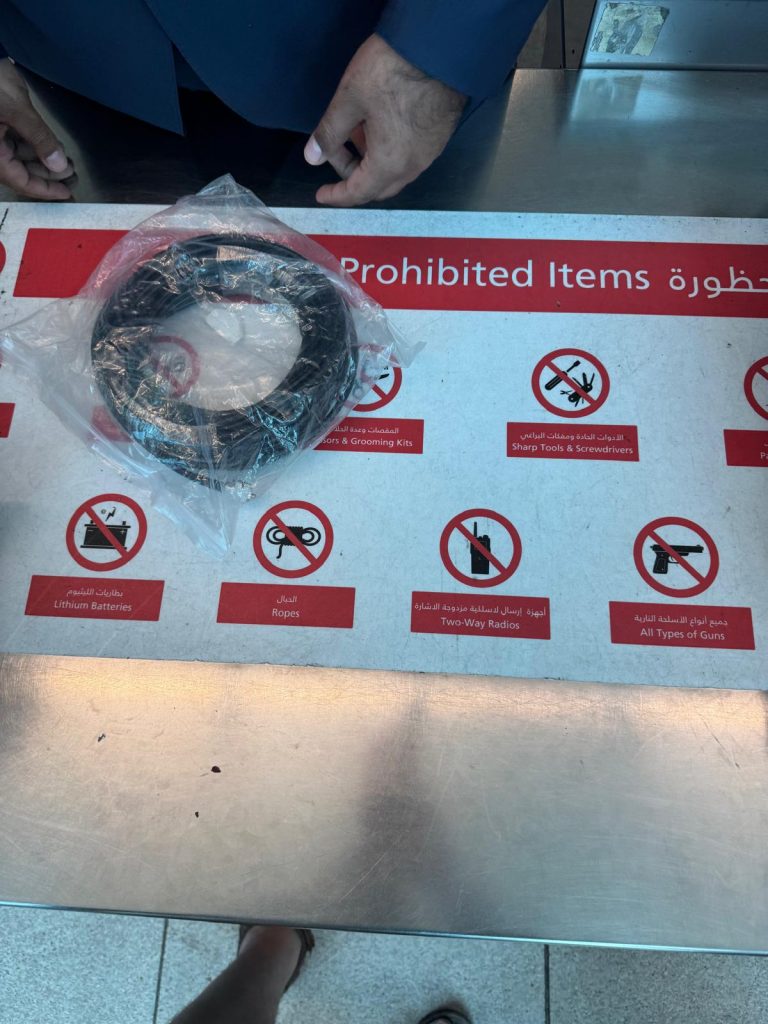 No cables are allowed in the checked in luggage by FlyDubai